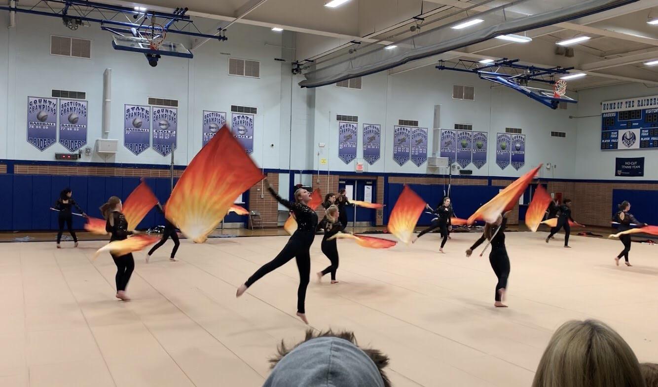 Winter guard showcases their skills to finish out their season The