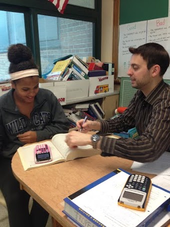  SAT Tutor Nicholas Tropeano helps Sophomore Maya Dunchus with an SAT problem
