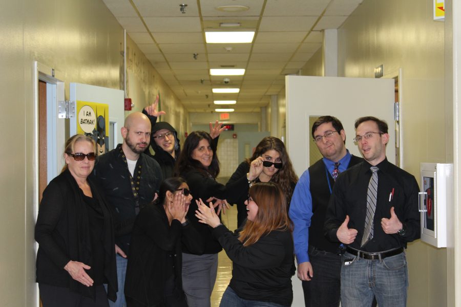 The science department poses for a silly picture in their Matrix-based attire. 