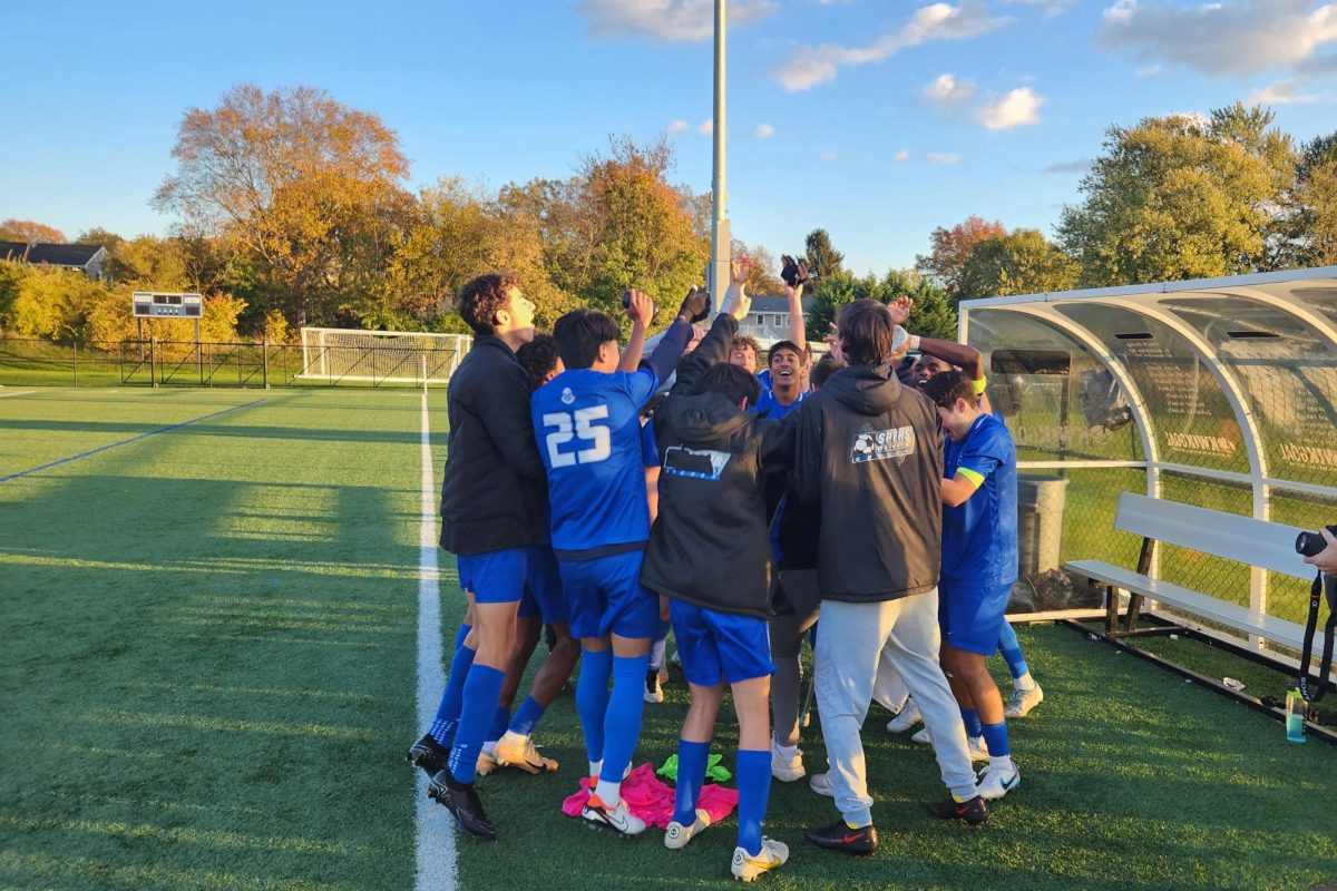 The+Raiders+celebrate+after+a+victory+in+the+semifinals+of+the+North+Jersey+Section+Two+Group+Four+tournament.+SPF+defeated+Ridge+1-0+on+Wednesday+Nov.+1+at+Shimme+Wexler+Field+to+advance+to+the+Sectional+Finals.