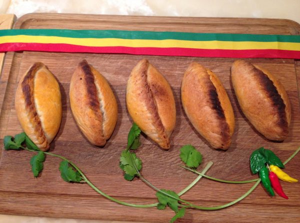 Bolivian empanadas are popular in some hispanic traditional dinners. They were displayed for a Thanksgiving dinner. 
