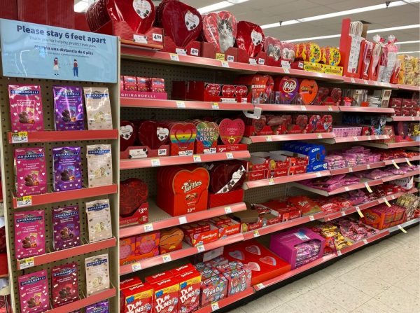 Rows of Valentine’s Day candies reflect the mass production for the holiday. The holiday became commercially popular in America in the mid-1800s.