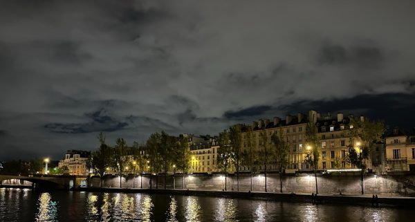 Paris architecture illuminates and contrasts the dark sky. This was the view from a boat cruise on the Seine. 