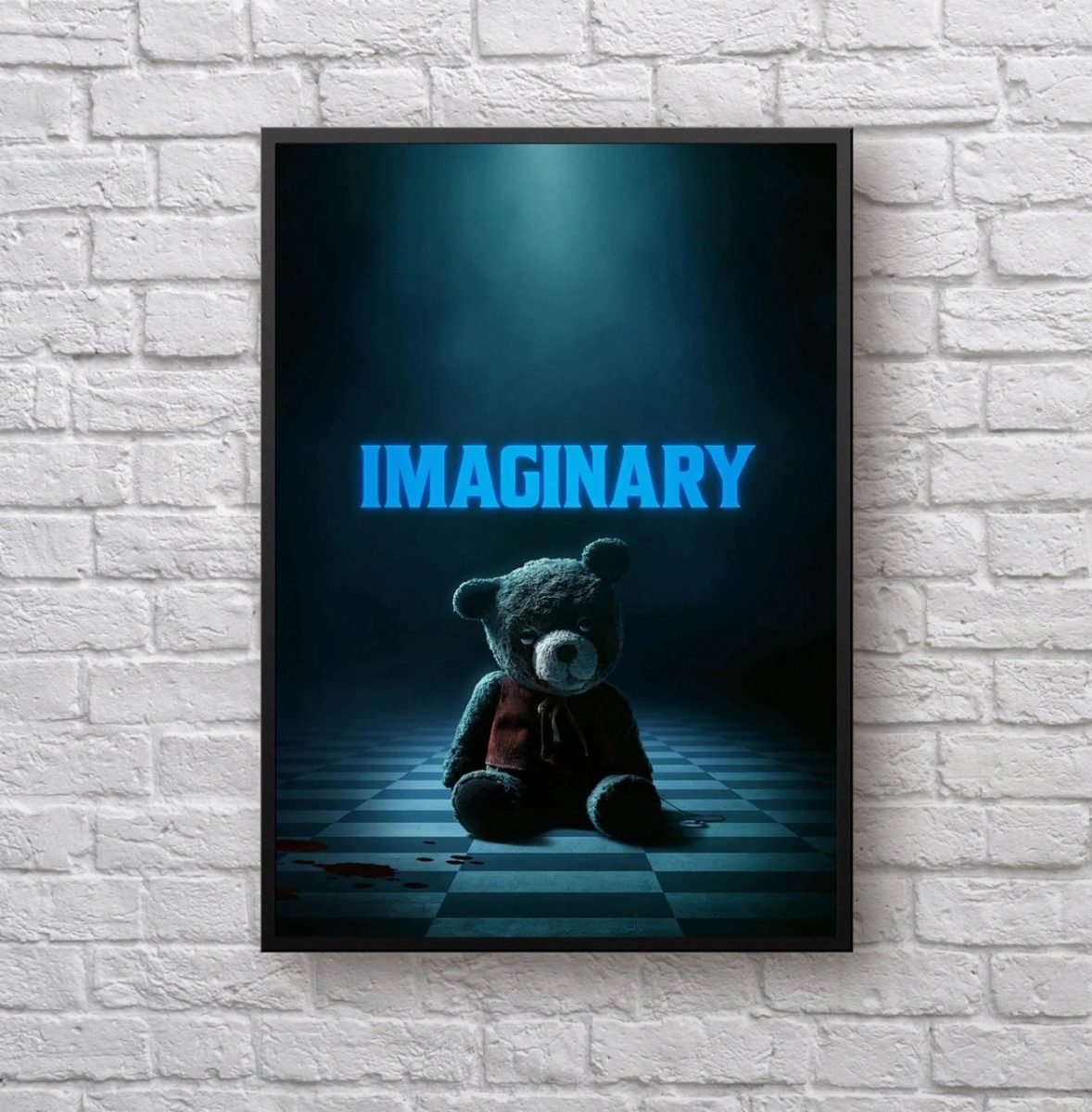 A poster hangs on a wall, displaying an image of Chauncey Bear, featured in the film “Imaginary”. Chauncey was a key character in the film and provided many frights for viewers.