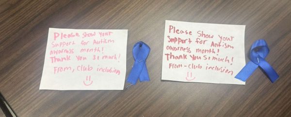 The color blue symbolizes support for autism. Members of Club Inclusion gathered to make ribbon pins accompanied with notes. 