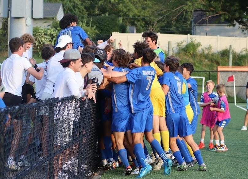 The SPF Boys Soccer team celebrates with Raider Nation after Taso Pavlou's golden goal winner. The Scotch Plains-Fanwood Raiders beat the Montclair Mounties 3-2 at Scotch Plains-Fanwood High School on Monday, Sept. 9.