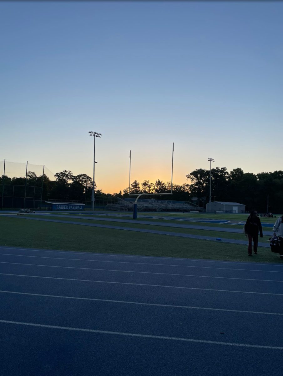 The Class of 2025 watches as the sun rises in one of the first few days of their senior year. After the sunrise, many students went to get breakfast at local establishments.