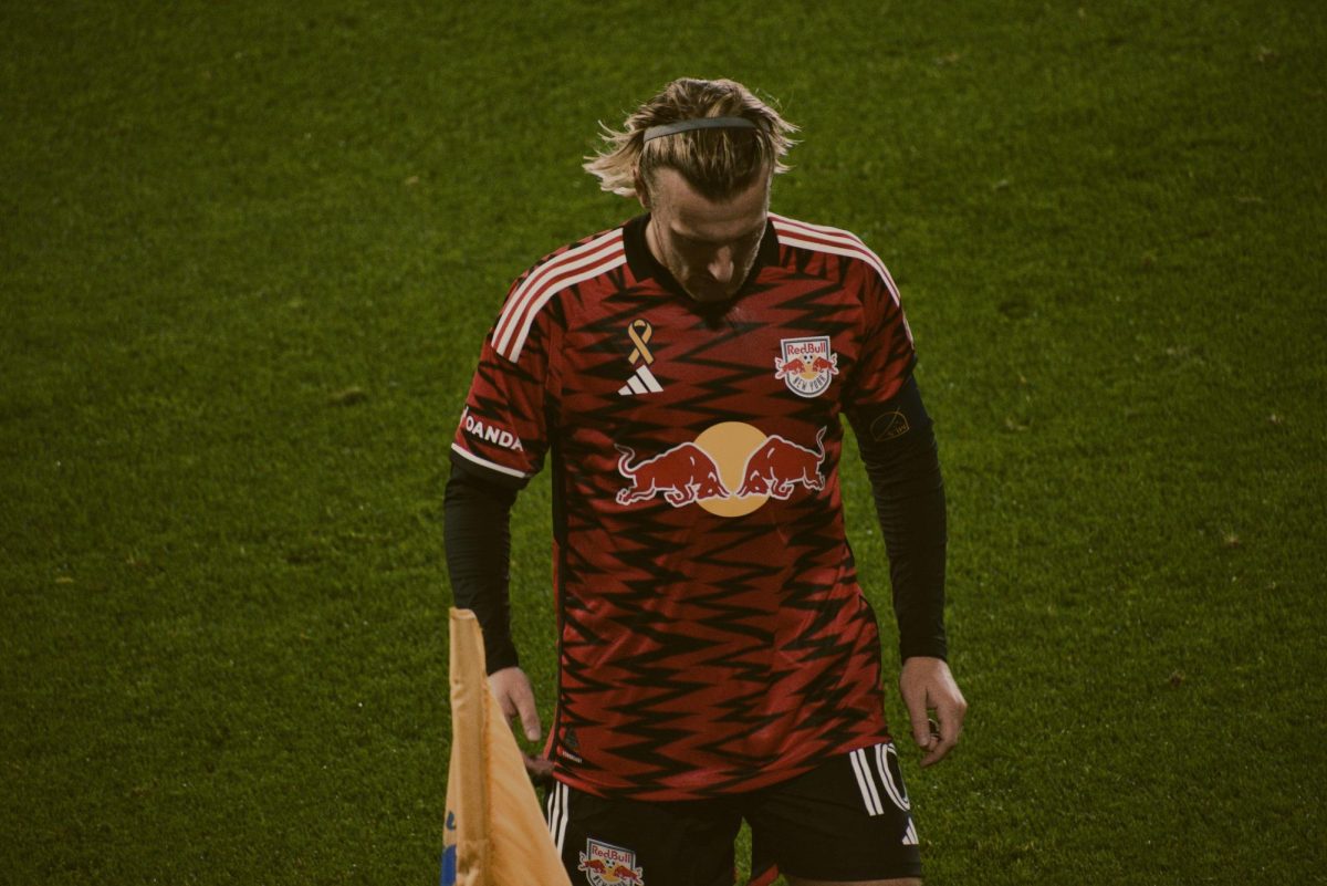 New York Red Bulls Captian Emil Forsberg prepares for a conerkick. Forsberg lifts his team to their 15th-straight playoff appearance.