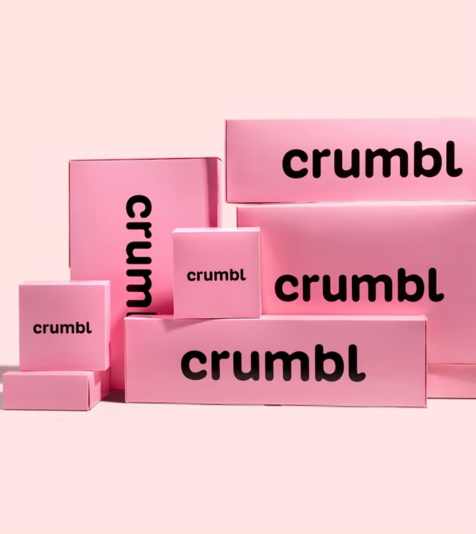 The iconic pink Crumbl box is hard to miss. It has become a staple in the company’s image.