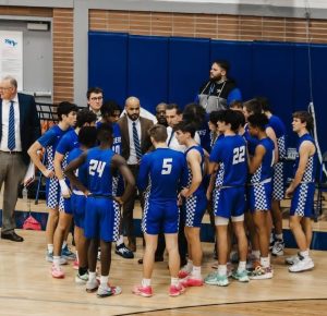 The Scotch Plains-Fanwood Boys Basketball team huddles during a timeout. The Raiders went 15-12 in 2023-2024, and won the Union County Conference - Mountain division.