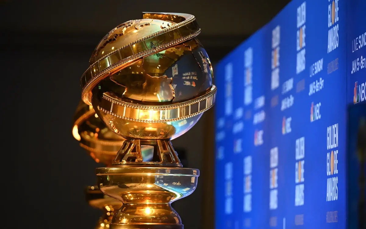 A Golden Globe award is illuminated by stage lights. On Jan. 5, Hollywood’s elites took home trophies in 27 categories in film, television and production.