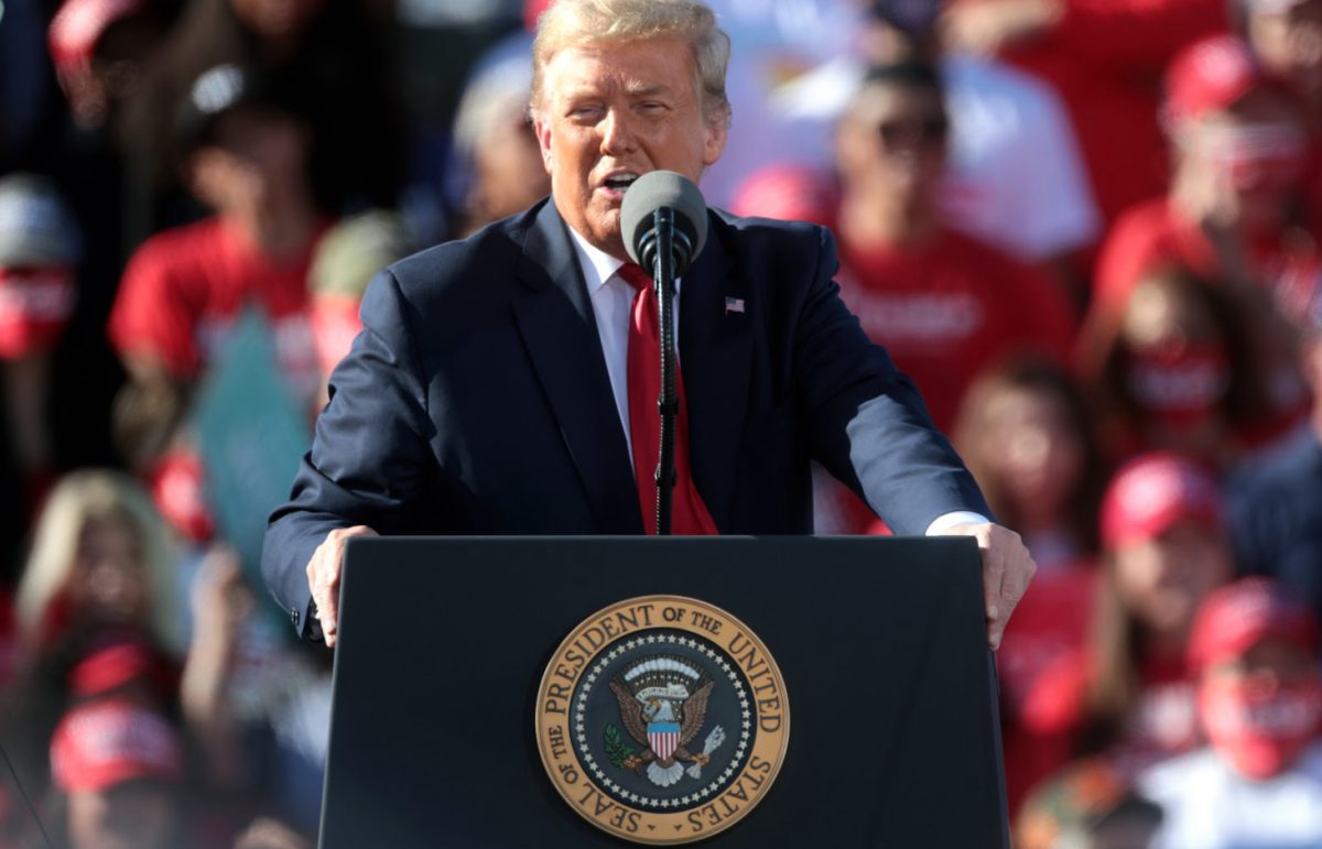 Donald Trump delivers a speech at his rally in Dodge County Airport, Oct. 6, 2024, in Juneau, Wis. 
