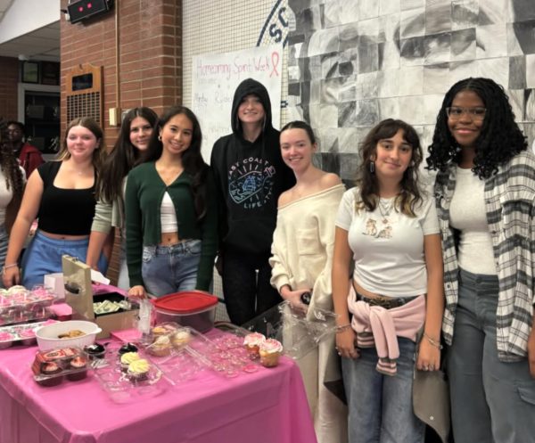 Women’s Health Club founder, Sophia Labazzo, and members at a bake sale fundraiser on Oct. 22. All funds were donated to the Breast Cancer Research Foundation.