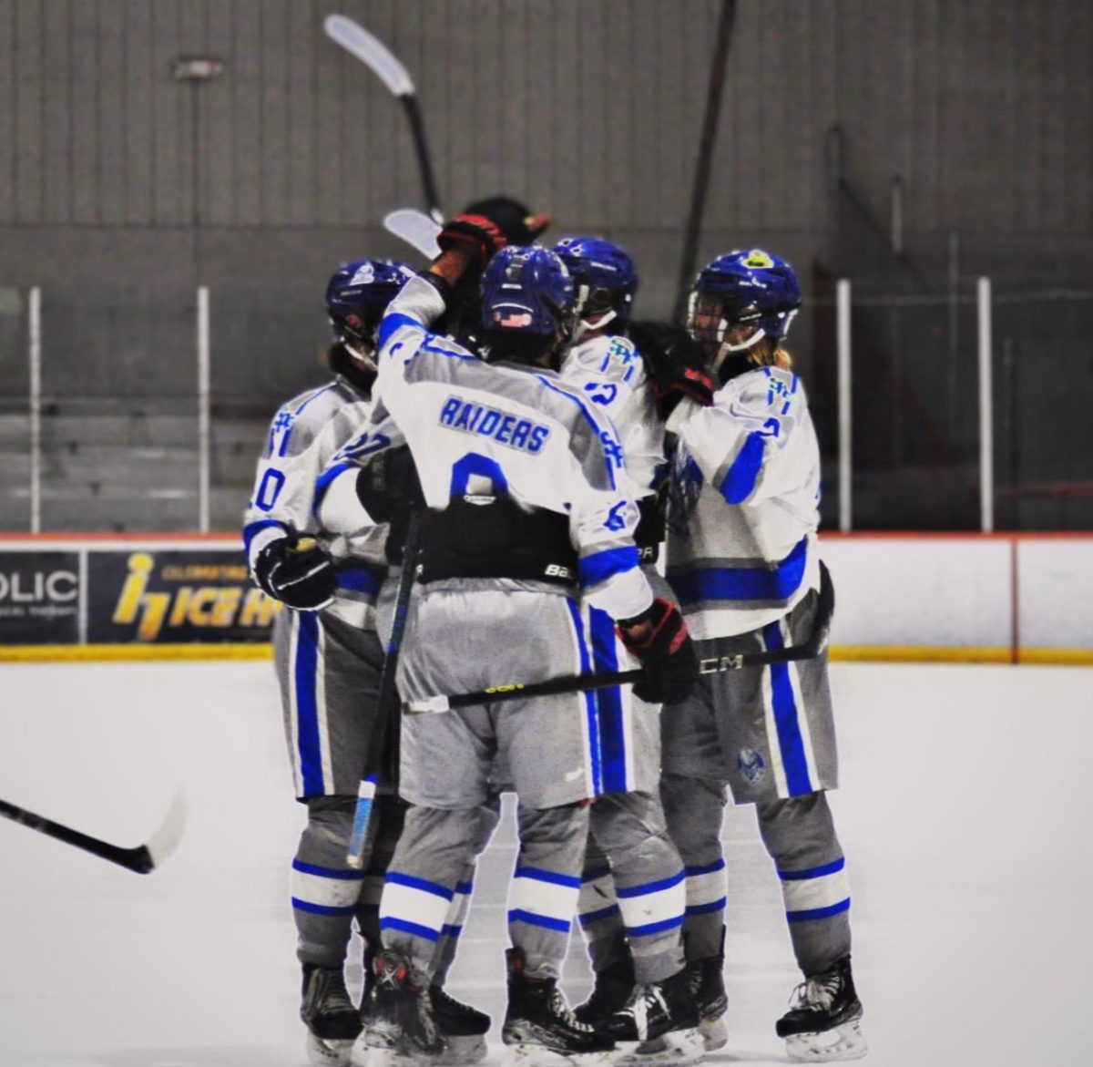 The Scotch Plains-Fanwood hockey team celebrates after a goal. The Raiders defeated Frisch 7-0 on Jan. 11. 