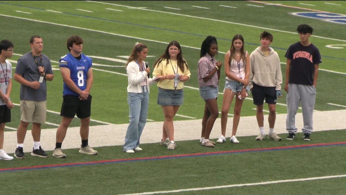 Senior student leaders speak at the SPFHS pep rally on Sept. 5. They shared their experiences in high school and how excited they were to see everyone back.