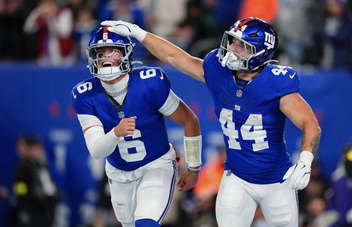No. 6 Jaxson Dart and No. 44 Cam Skattebo celebrate after combining for five touchdowns against the Philadelphia Eagles. The Giants defeated the reigning Super Bowl champions on Thursday, Oct. 9.