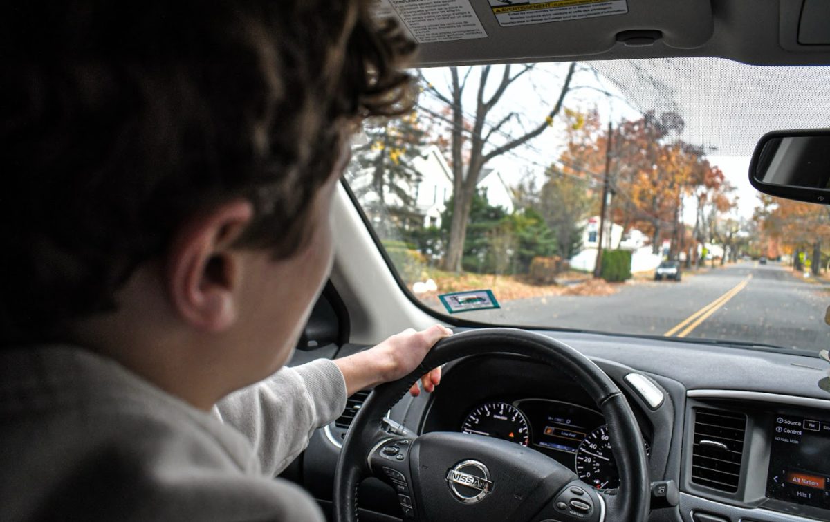 Senior Jacob Friedman focuses on the road as he practices his driving skills. He already has his license and can drive freely. 