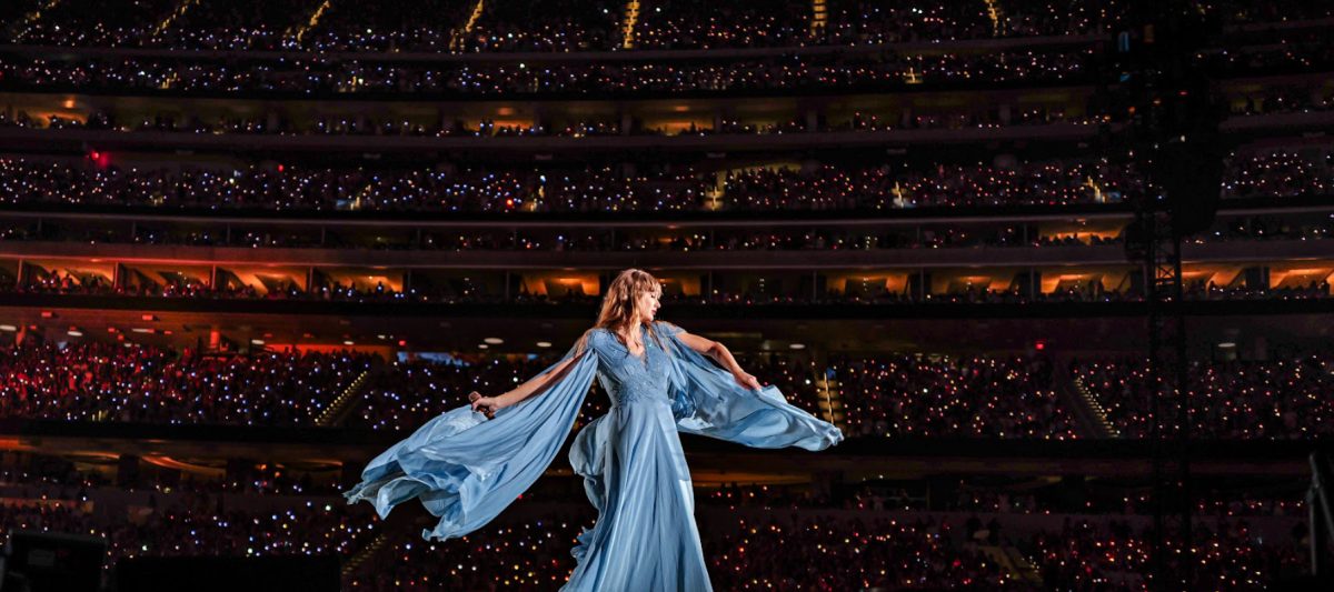 Taylor Swift is dancing on stage at SoFi Stadium during her “Folklore” set in her blue dress. There were thousands of people who came to her show and danced their hearts out on Aug. 9, 2023. 