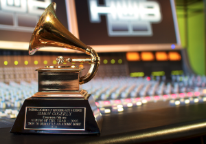 Display of the Album of the Year Grammy trophy. The event occurs every year to award music artists for the best albums or songs of the year. 
