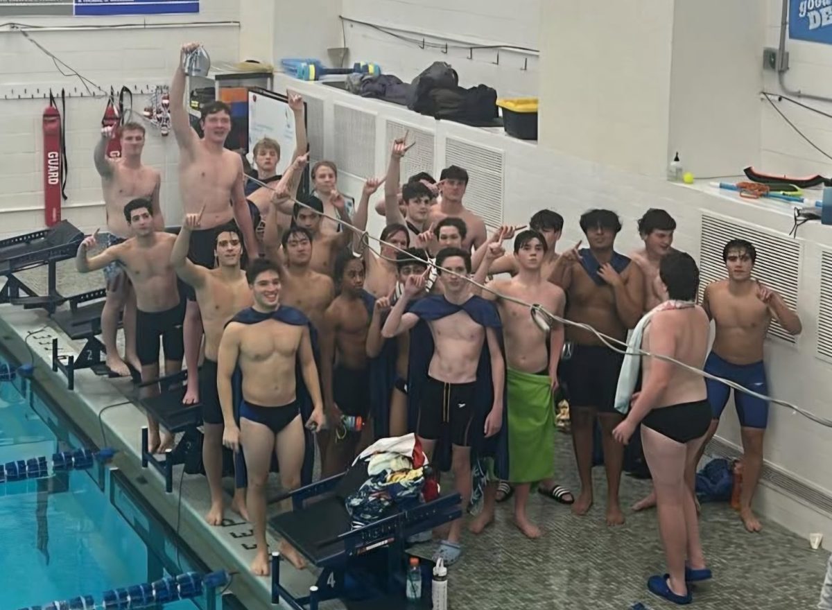 The Scotch Plains-Fanwood boys swimming team poses for a photo after winning their meet against Westfield. This meet was close, which made the final relay being the deciding factor.
