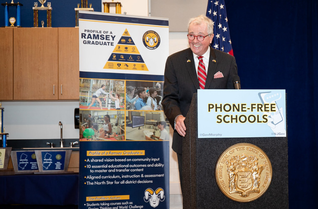 Governor Phil Murphy signs the bill outlining the phone ban in NJ schools.  New Jersey officially announced the state’s plan for  phone-free schools.
