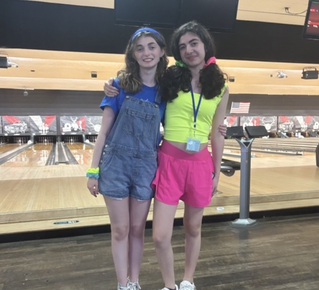 Evelyn Lieberman and Samantha Lionetti stand together in their 90’s fashion looks. They took this photo at the bowling event that the Music Department hosted. 